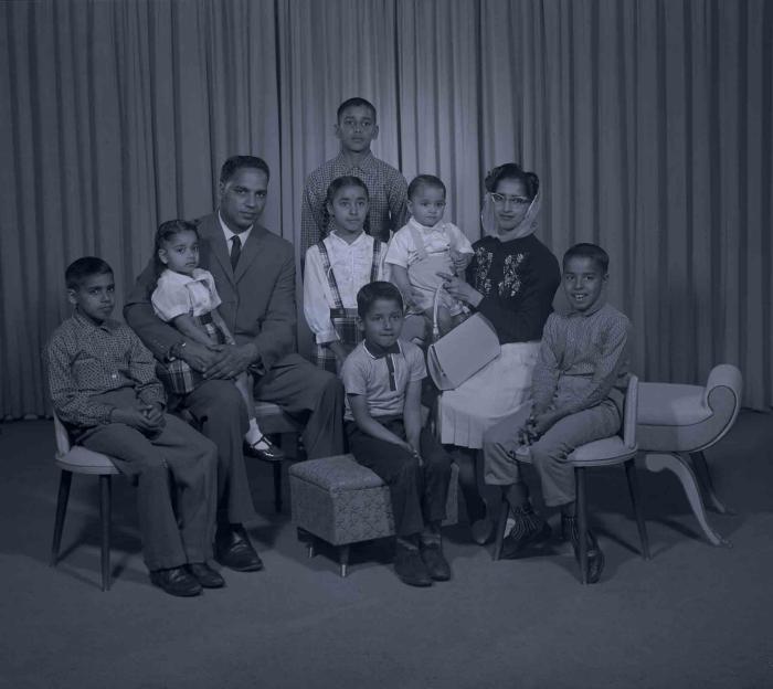 [Photo of Mrs. Ossie with family members]