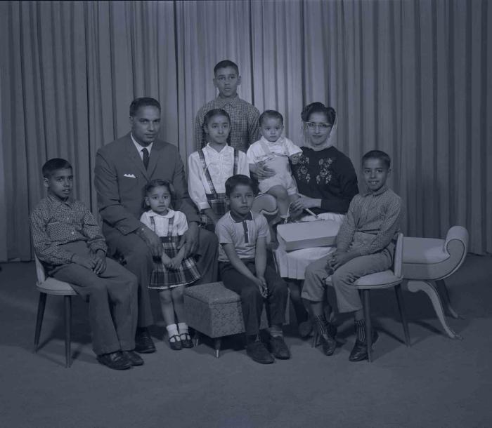 [Photo of Mrs. Ossie with family members]