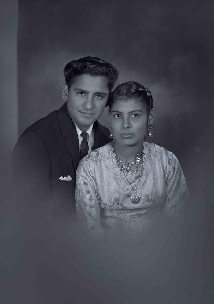 [Photo of Gurmel Singh and an unidentified bride]