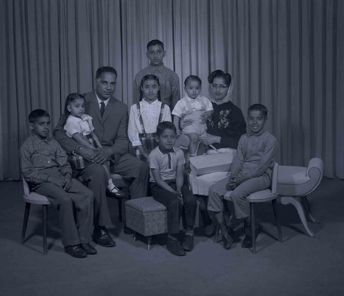 [Photo of Mrs. Ossie with family members]