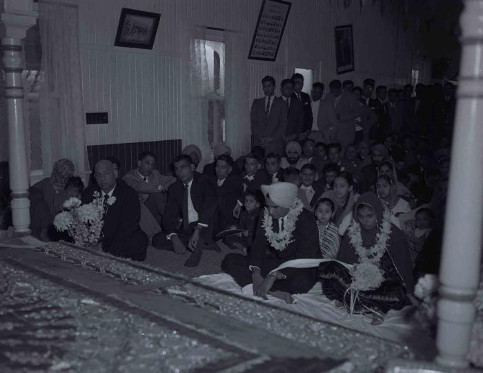 [Photo of Gurmel Singh and an unidentified bride]