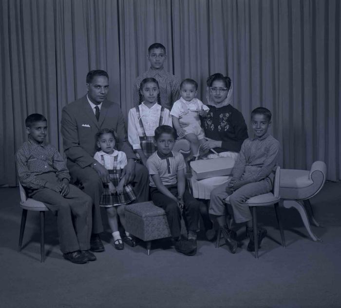 [Photo of Mrs. Ossie with family members]