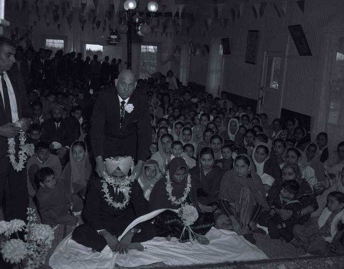 [Photo of Gurmel Singh and an unidentified bride]