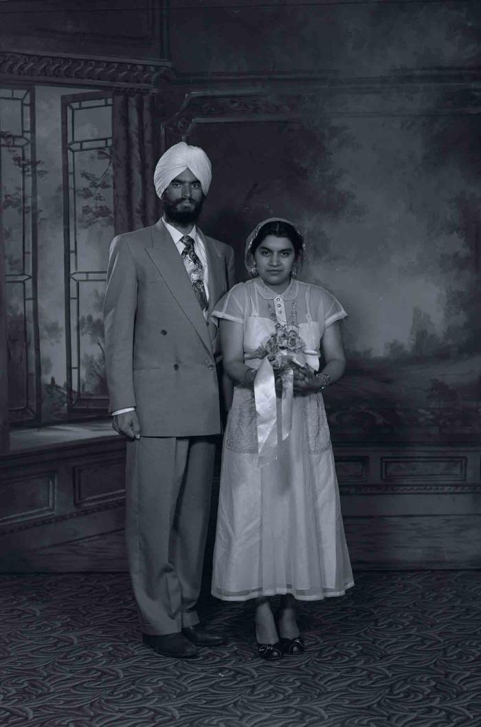 [Photo of Gurbachan Singh with an unidentified woman]