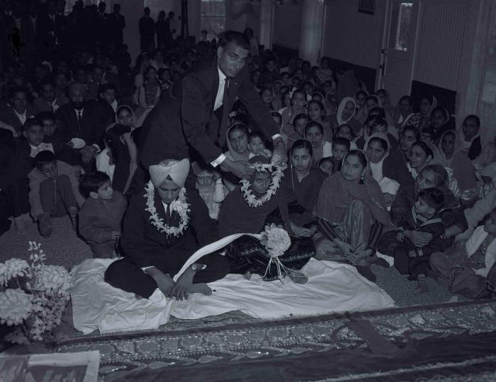 [Photo of Gurmel Singh and an unidentified bride]
