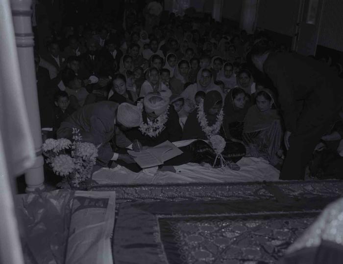 [Photo of Gurmel Singh and an unidentified bride]