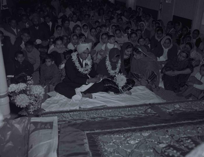 [Photo of Gurmel Singh and an unidentified bride]