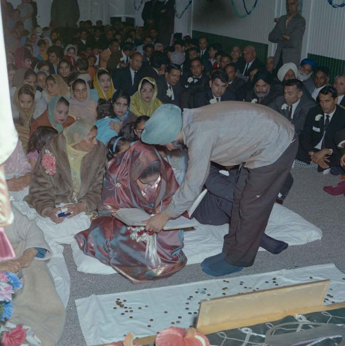 [Photo of Gurdev Singh and Sarjit Kaur]