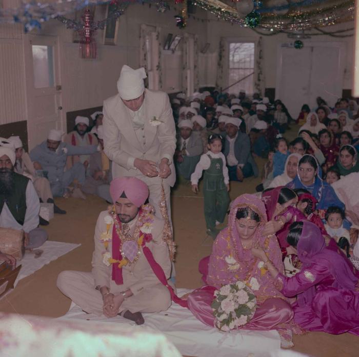 [Photo of Gurmeet Sidhu and Tina Gill]