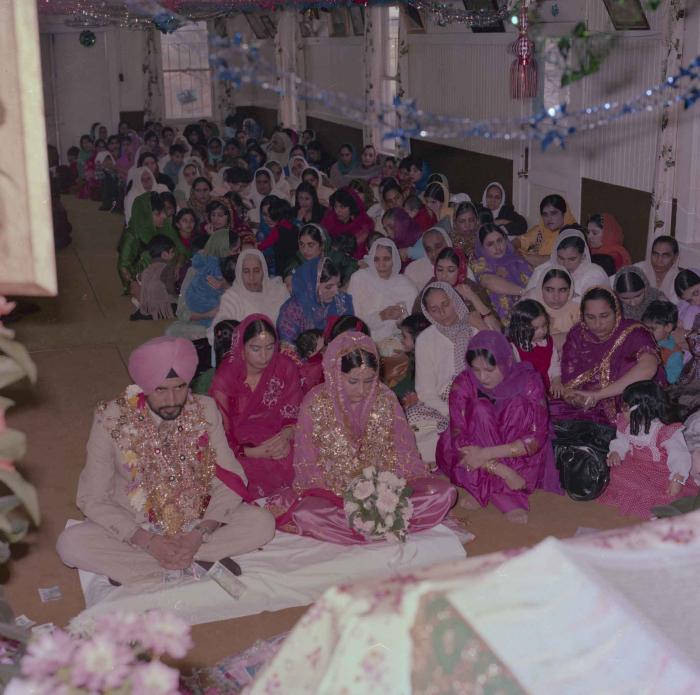[Photo of Gurmeet Sidhu and Tina Gill]