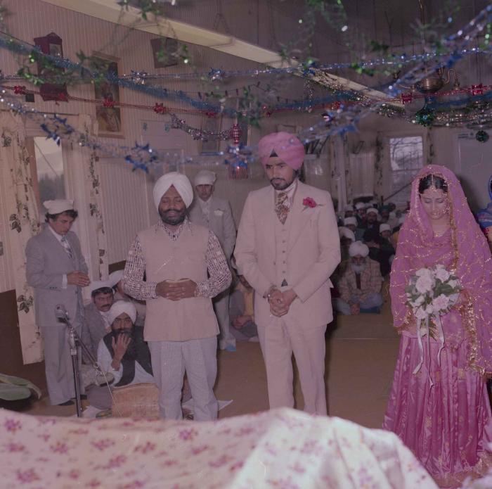 [Photo of Gurmeet Sidhu and Tina Gill]