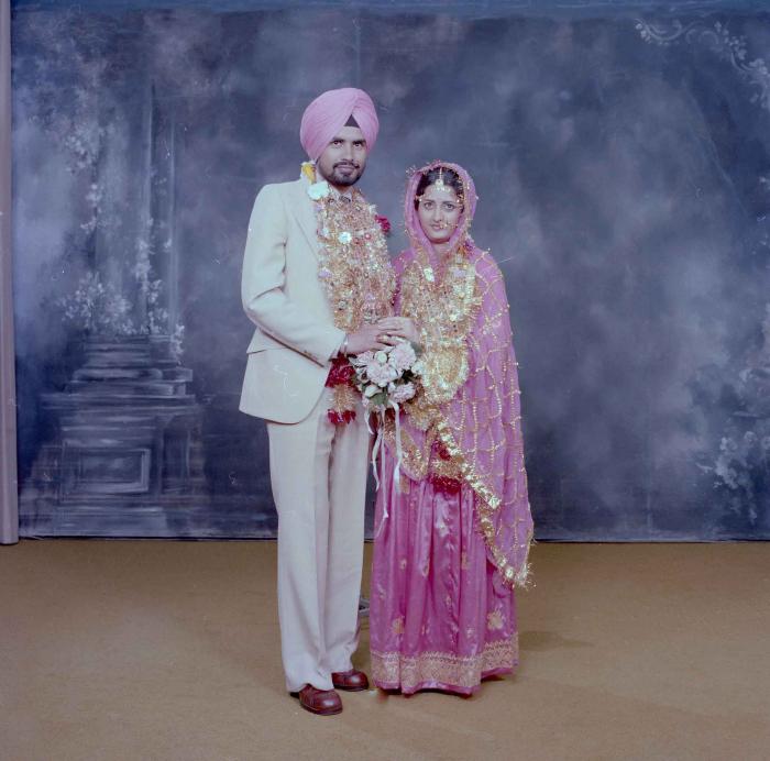 [Photo of Gurmeet Sidhu and Tina Gill]