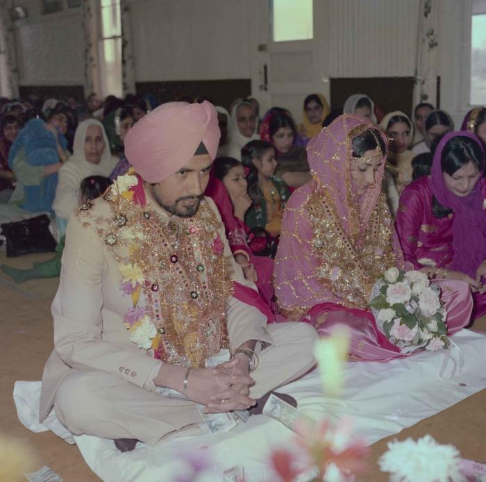 [Photo of Gurmeet Sidhu and Tina Gill]