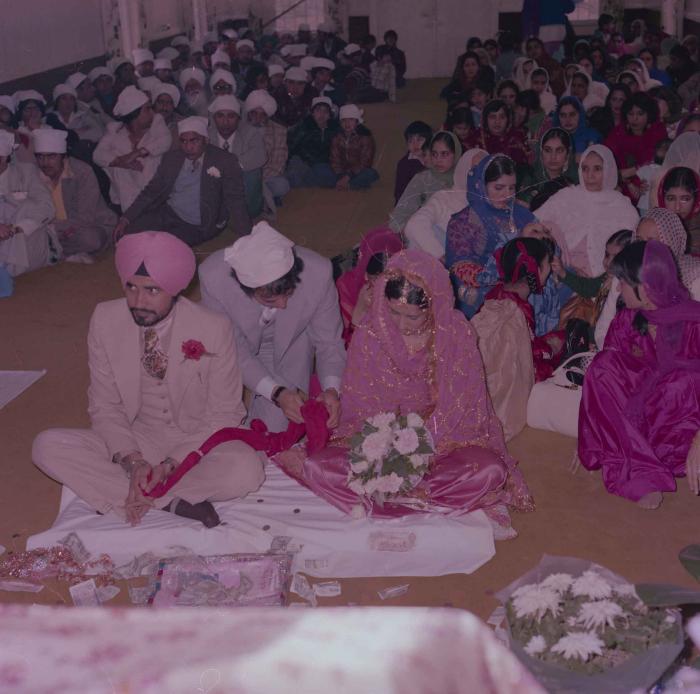[Photo of Gurmeet Sidhu and Tina Gill]