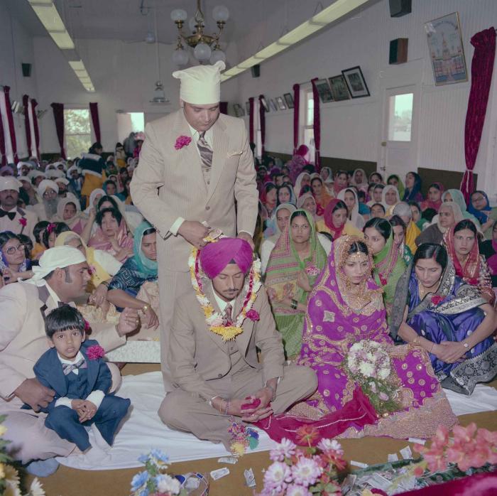 [Photo of Baljit Sidhu and Inderjit Gill]