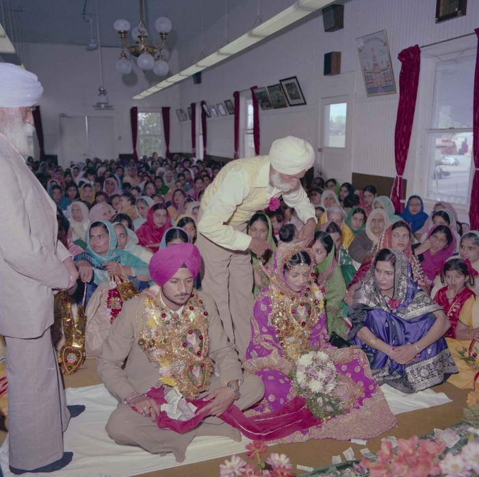 [Photo of Baljit Sidhu and Inderjit Gill]