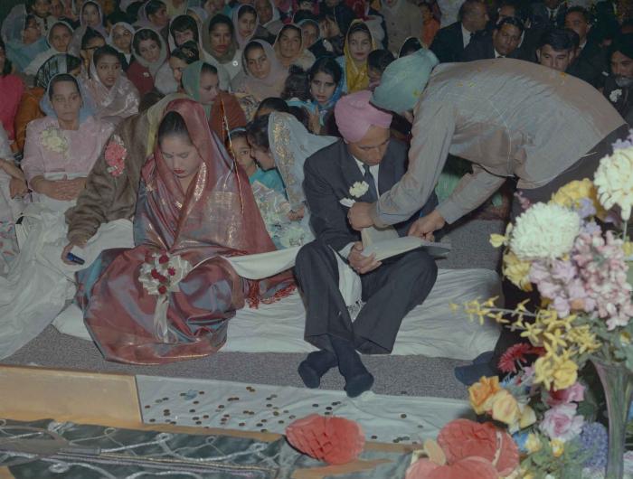 [Photo of Gurdev Singh and Sarjit Kaur]