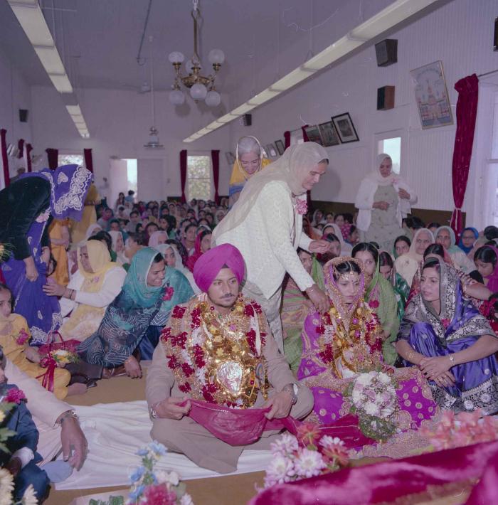 [Photo of Baljit Sidhu and Inderjit Gill]