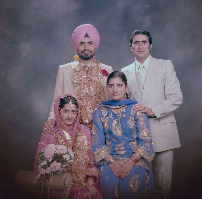 [Photo of Gurmeet Sidhu and Tina Gill]