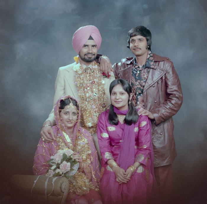 [Photo of Gurmeet Sidhu and Tina Gill]