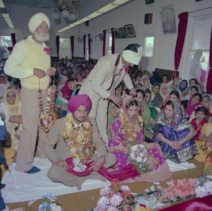 [Photo of Baljit Sidhu and Inderjit Gill]