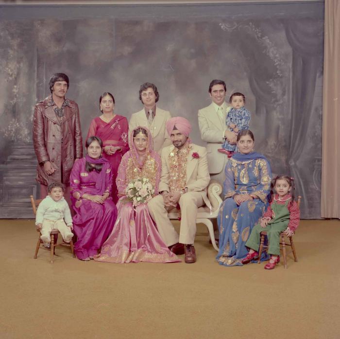 [Photo of Gurmeet Sidhu and Tina Gill]