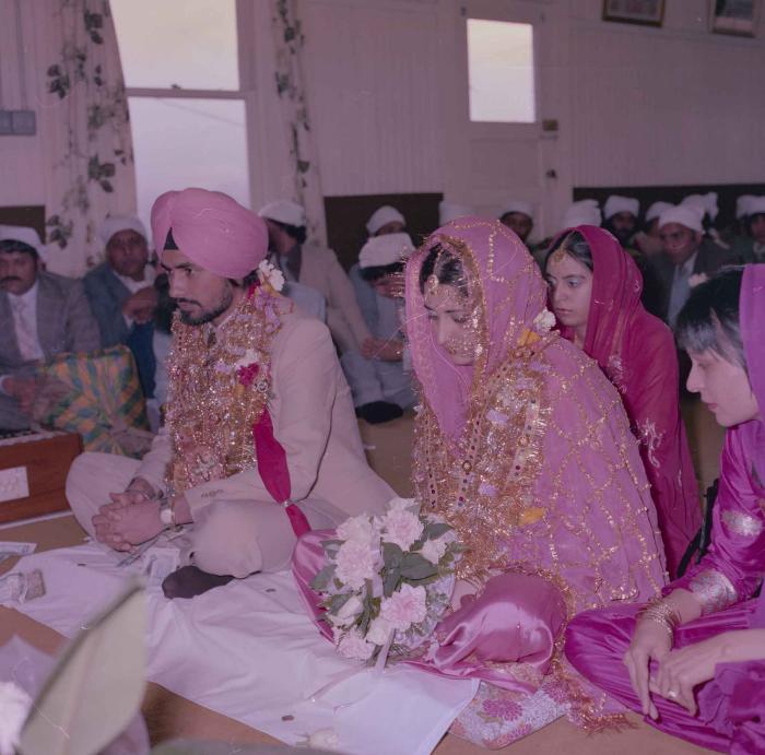 [Photo of Gurmeet Sidhu and Tina Gill]