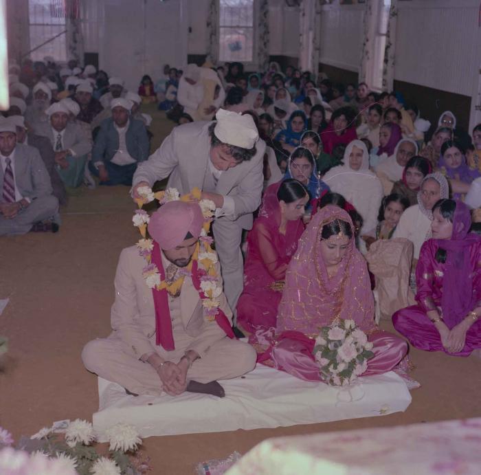 [Photo of Gurmeet Sidhu and Tina Gill]