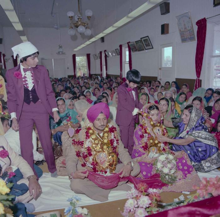[Photo of Baljit Sidhu and Inderjit Gill]