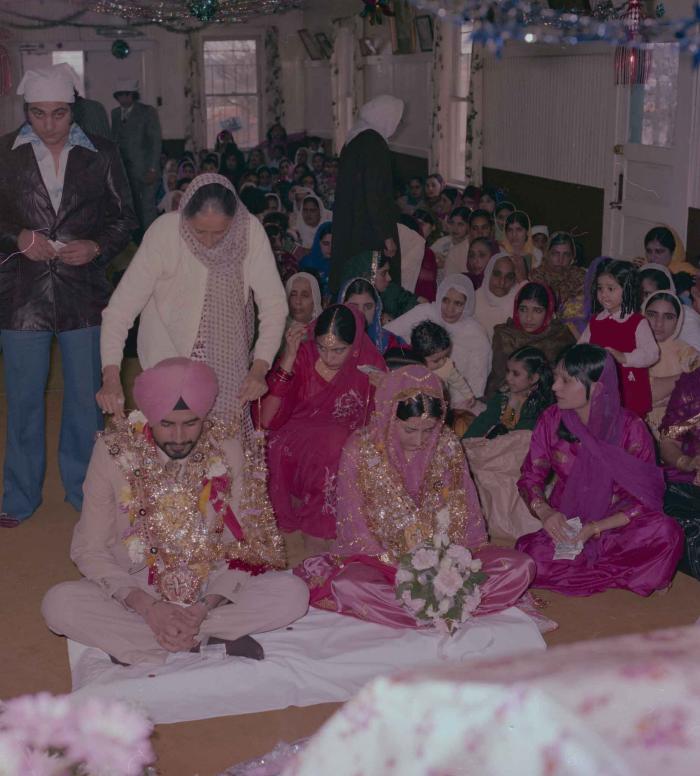 [Photo of Gurmeet Sidhu and Tina Gill]