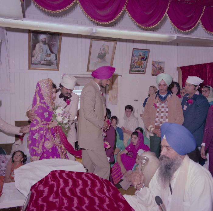 [Photo of Baljit Sidhu and Inderjit Gill]