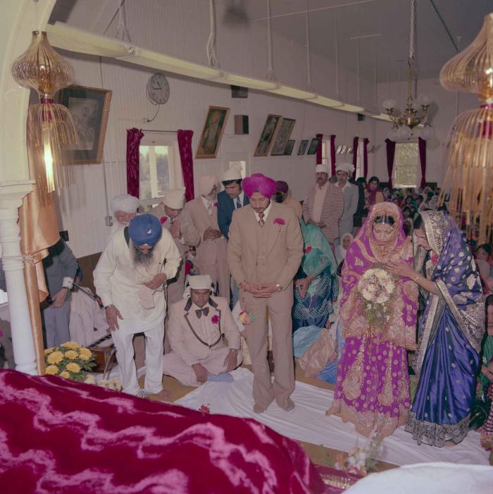 [Photo of Baljit Sidhu and Inderjit Gill]