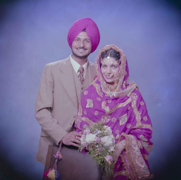 [Photo of Baljit Sidhu and Inderjit Gill]