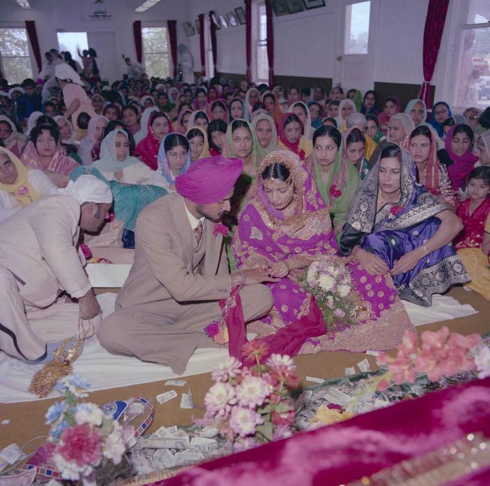 [Photo of Baljit Sidhu and Inderjit Gill]