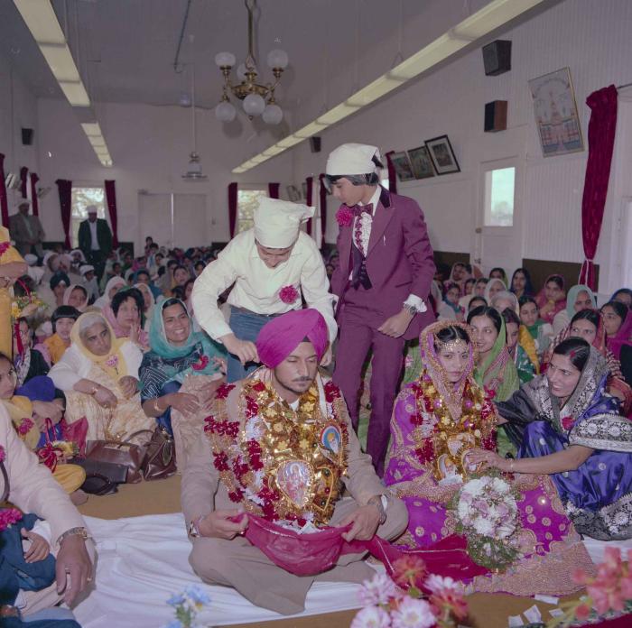[Photo of Baljit Sidhu and Inderjit Gill]
