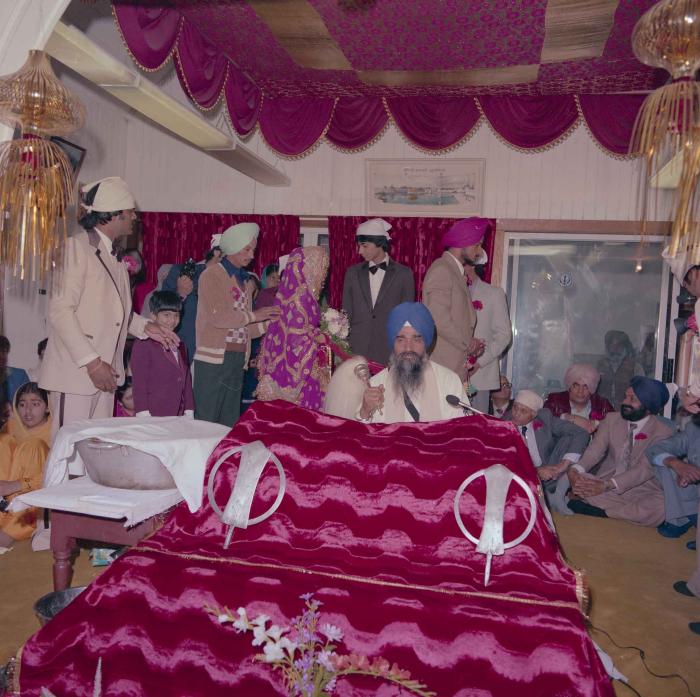 [Photo of Baljit Sidhu and Inderjit Gill]