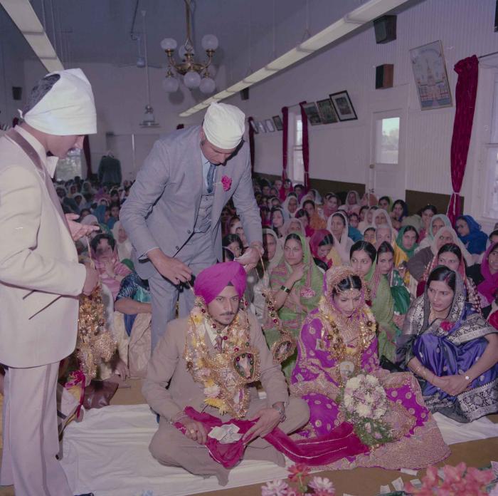 [Photo of Baljit Sidhu and Inderjit Gill]
