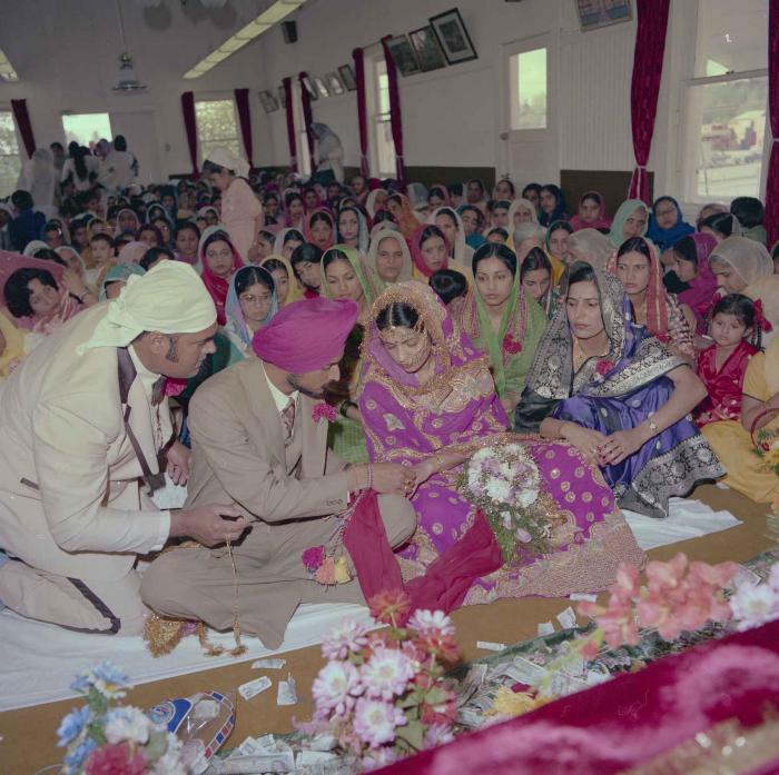 [Photo of Baljit Sidhu and Inderjit Gill]
