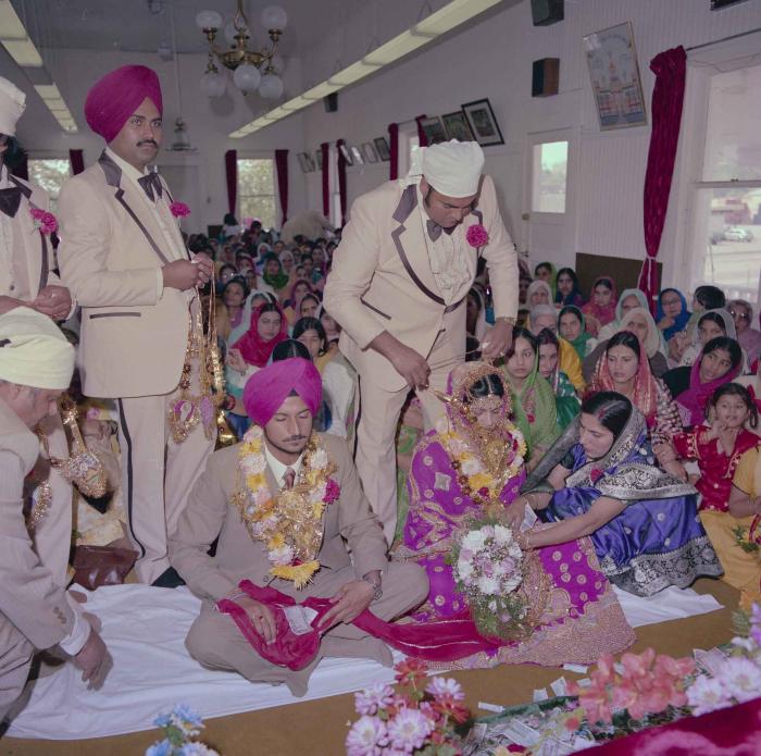 [Photo of Baljit Sidhu and Inderjit Gill]