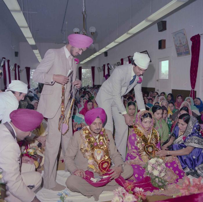 [Photo of Baljit Sidhu and Inderjit Gill]