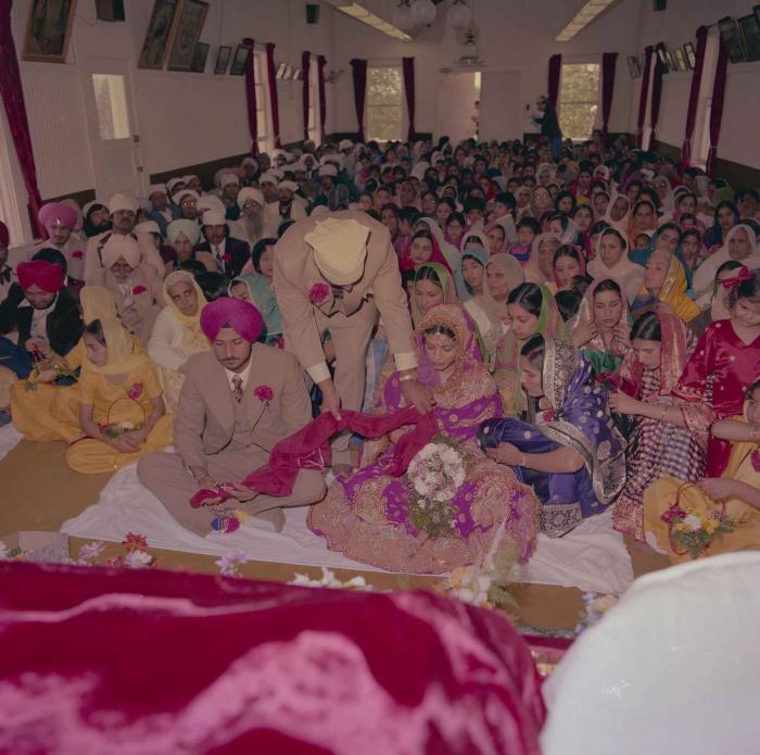 [Photo of Baljit Sidhu and Inderjit Gill]