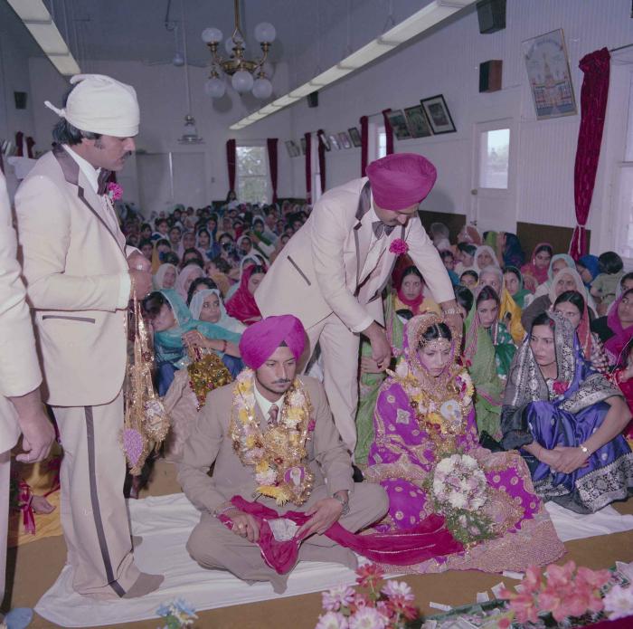 [Photo of Baljit Sidhu and Inderjit Gill]