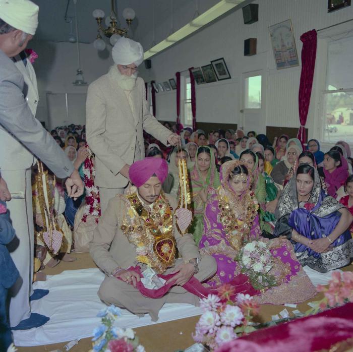 [Photo of Baljit Sidhu and Inderjit Gill]