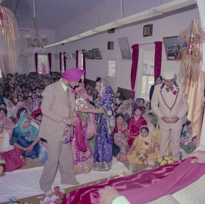 [Photo of Baljit Sidhu and Inderjit Gill]