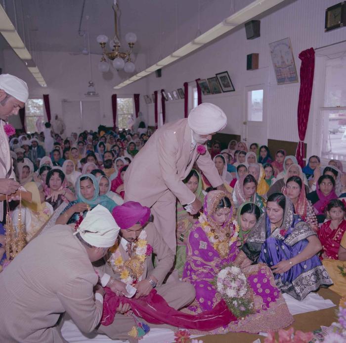 [Photo of Baljit Sidhu and Inderjit Gill]
