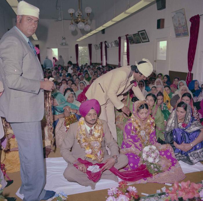 [Photo of Baljit Sidhu and Inderjit Gill]