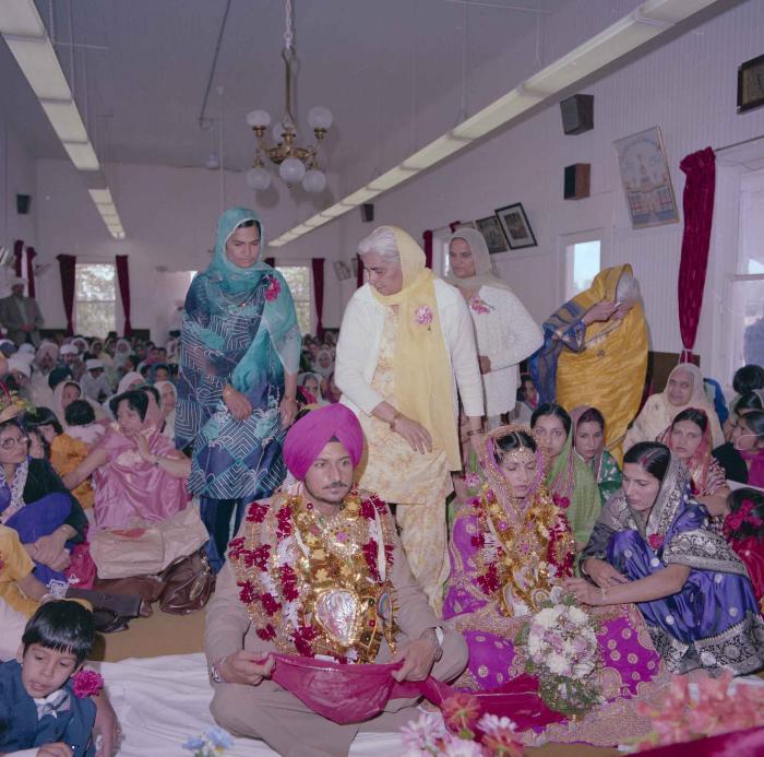 [Photo of Baljit Sidhu and Inderjit Gill]
