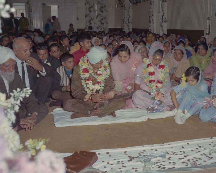 [Photo of Gurmel Singh with an unidentified bride]