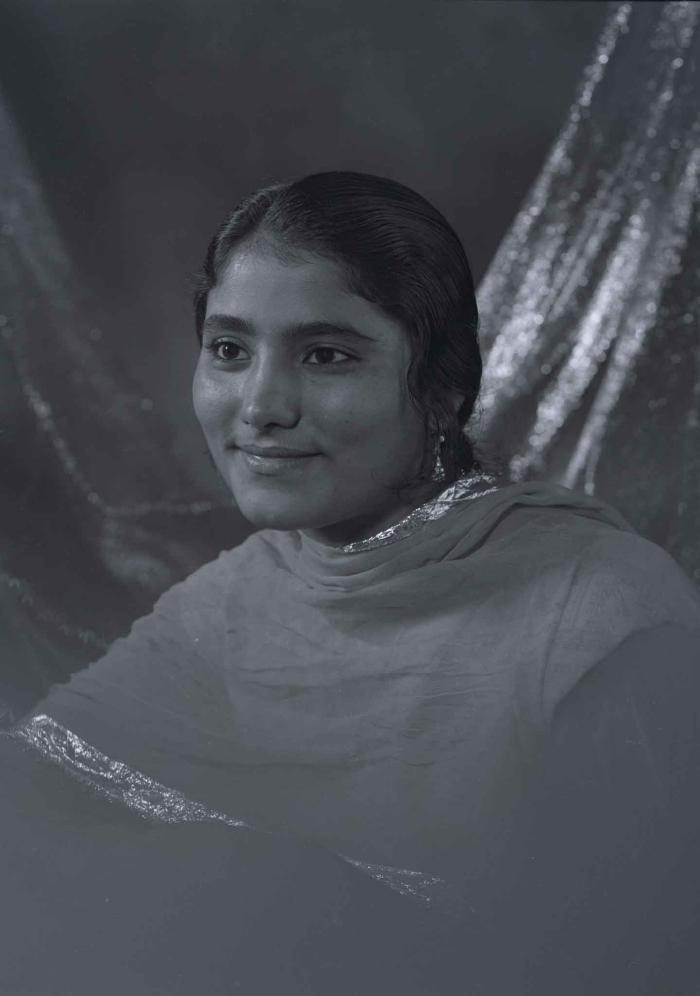 [Photo of Gurmel Sidhu]