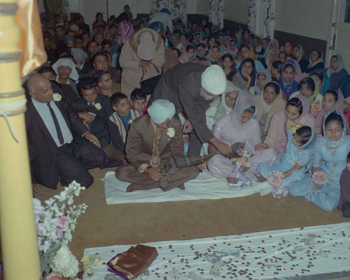 [Photo of Gurmel Singh with an unidentified bride]
